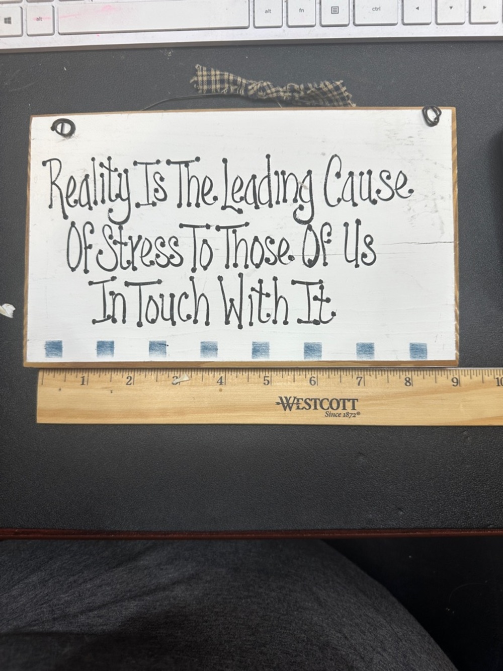 Source Unknown White Wood Wall Sign with Black Lettering and Blue Accents